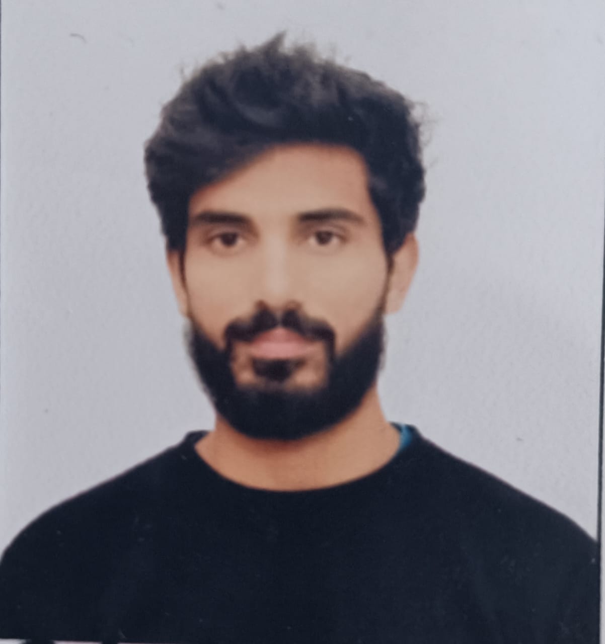 NAIM KHAN